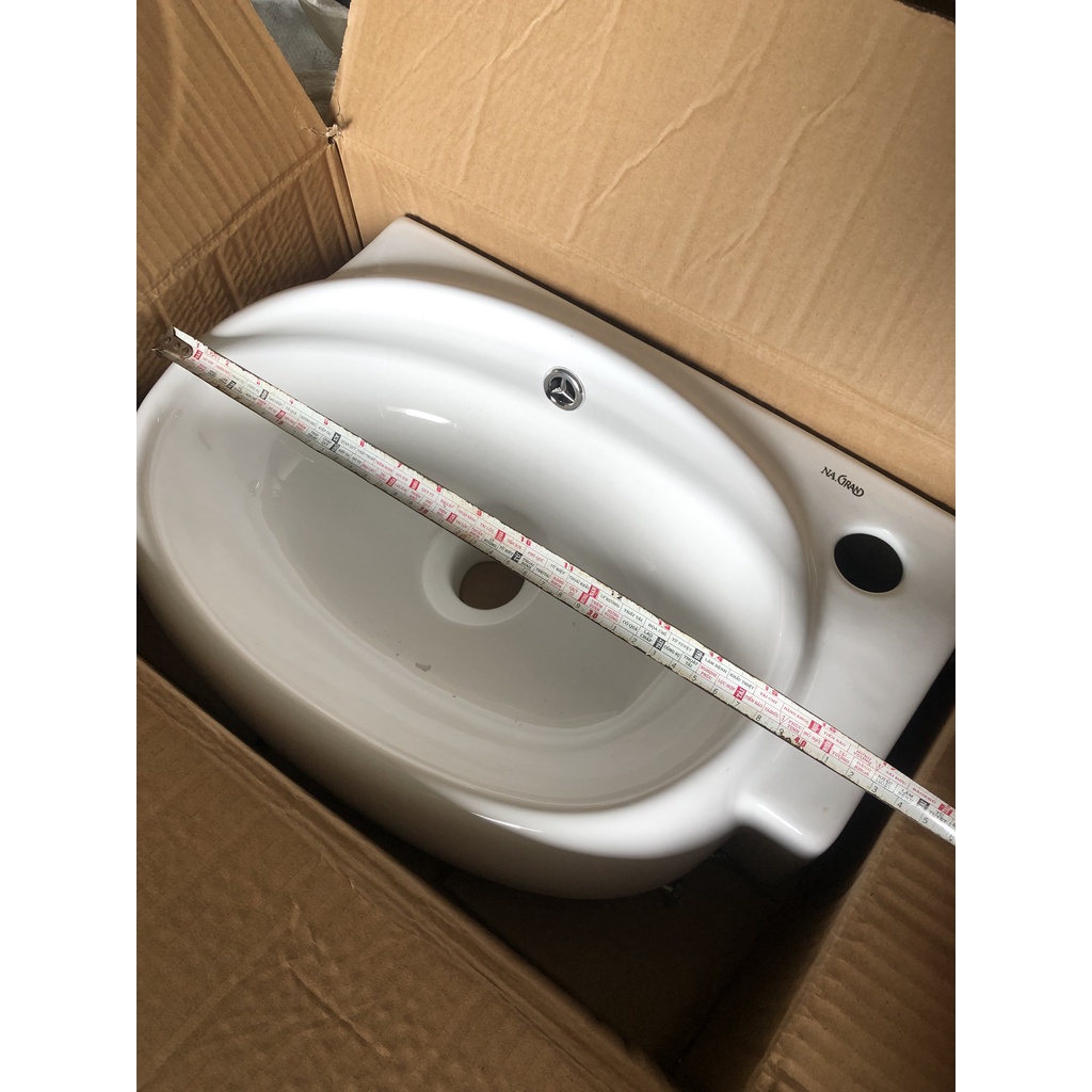 Chậu rửa mặt lavabo góc treo tường 422NA thương hiệu NA.GRAND, men NANO trắng sáng chống ố chống bám bẩn