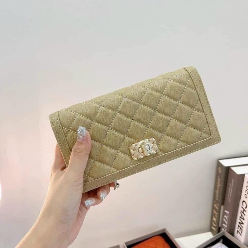 Túi Cnk nhám đen khóa  xoay cao cấp, thiết kế sang trọng.Full hộp đựng