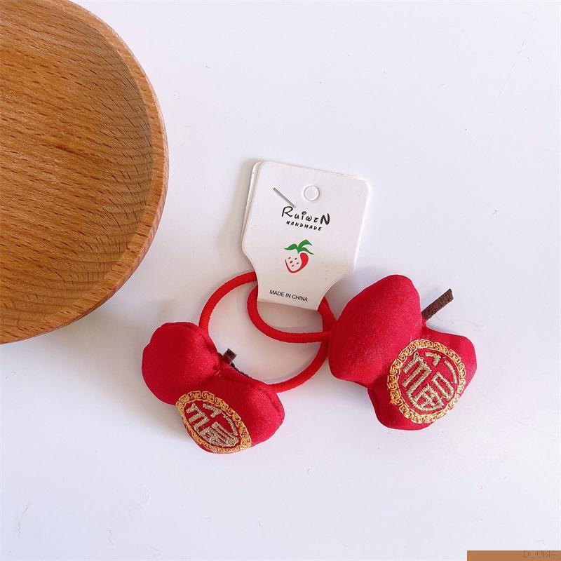 Kẹp tóc hình chúc mừng năm mới đáng yêu cho bé