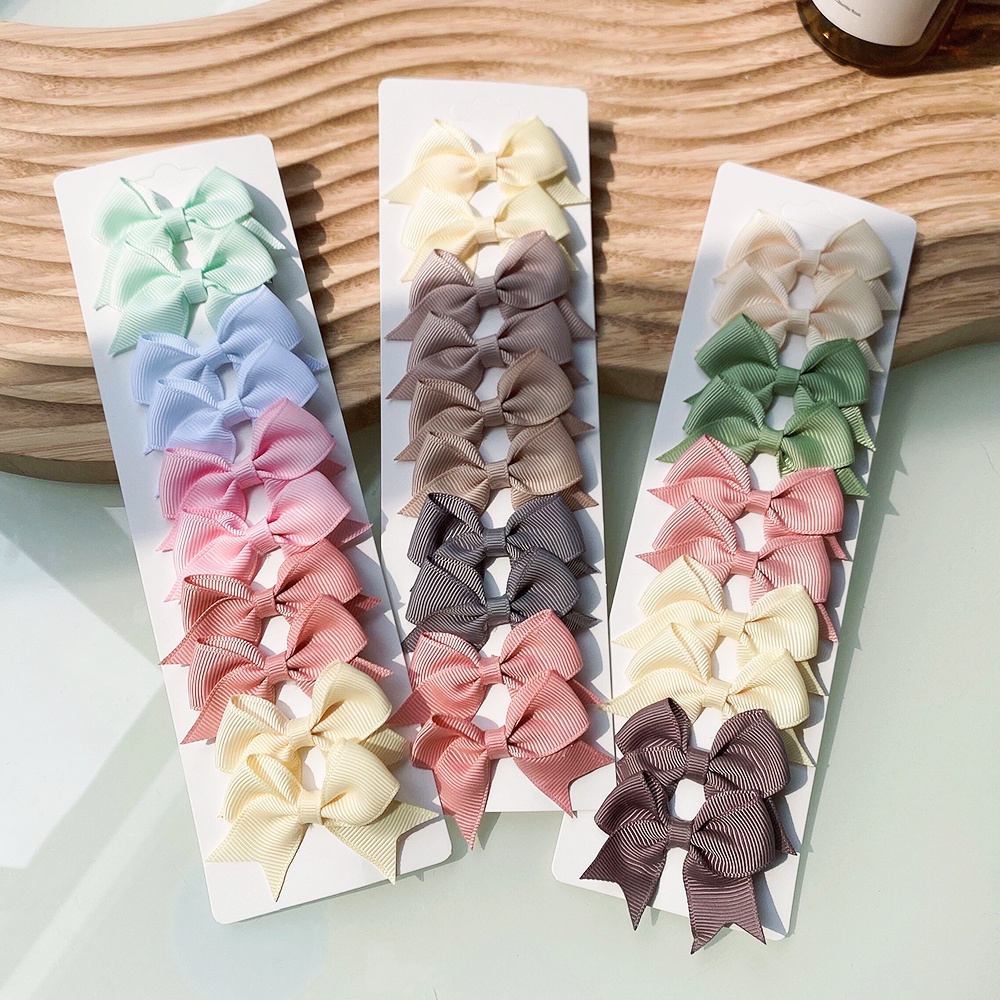 Set 10 kẹp tóc nơ ruy băng KIDSBOWS màu trơn dễ thương cho bé gái