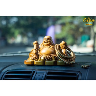 Tượng di lặc gỗ bách xanh, ô tô , bàn làm việc , trên kệ