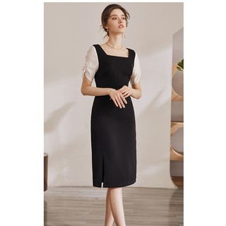 Đầm đen phối tay trắng xẻ trước công sở trơn