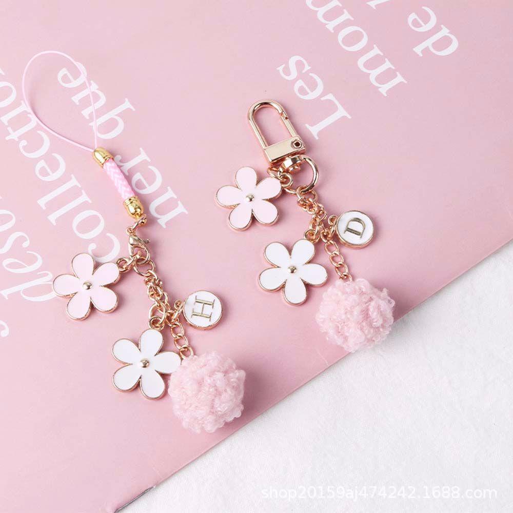 Móc Điện Thoại Bằng Kim Loại Họa Tiết Hoa Và Chữ Kèm Dây Đeo Hiệu Balenciages Thời Trang Cho Nữ
