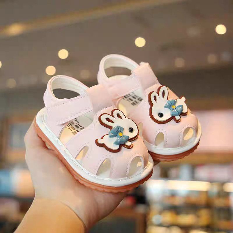 Sandal tập đi cho bé gái đế mềm chống trơn có kèn hoạt tiết thỏ