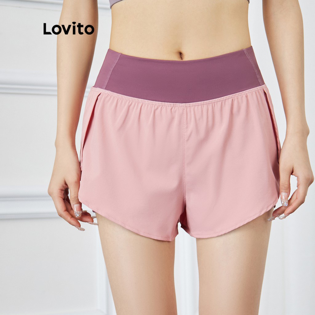 Quần short thể thao Lovito ghép nối màu phối túi xẻ tà L15X212 (màu hồng)
