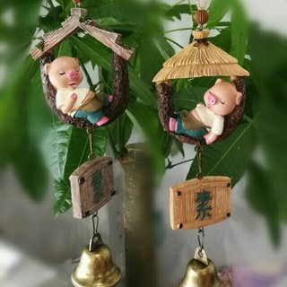 Chuông gió heo lười
