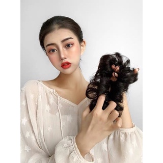 búi cột giả tóc xoăn