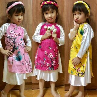 Áo dài cách tân. 
👑Mẫu hoa trà: Màu vàng, đỏ, sen. Dành cho các bé 10-24kg. Size S , M, . Các mL, XL, XXL
👑Mẫu hoa đào