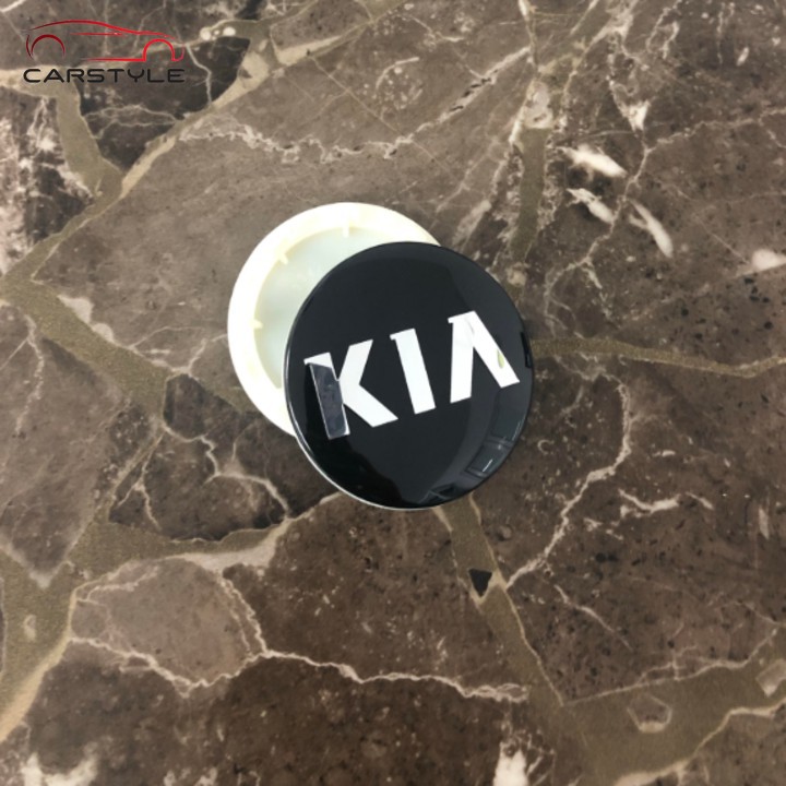 Logo chụp mâm bánh xe ô tô Kia 58mm màu đen và bạc K2 K5