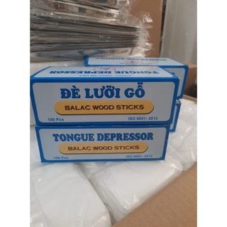 que đè lưỡi gỗ
