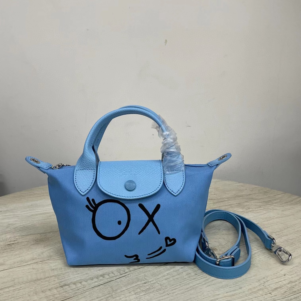 Túi Đeo Chéo Hình Bánh Bao graffiti Nhỏ Gọn Phong Cách Mới Cao Cấp Cho Nữ 77220519 Túi