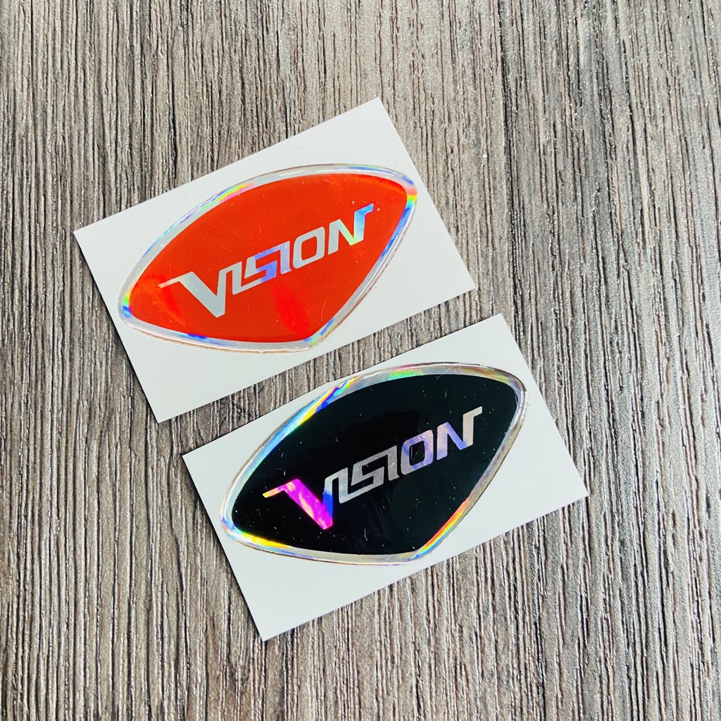 (TEM VISION) TEM LOGO VISION, tem phủ nhựa trong chữ VISION 2 màu lựa chọn