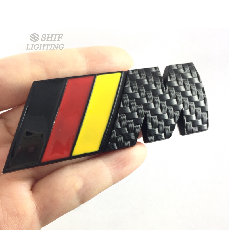 Miếng dán hình logo ///M bằng kim loại mặt sợi carbon dành cho xe hơi BMW