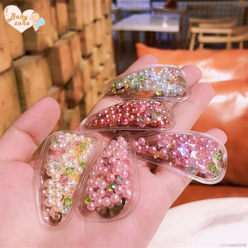 Kẹp tóc đính hạt giả ngọc trai cho bé