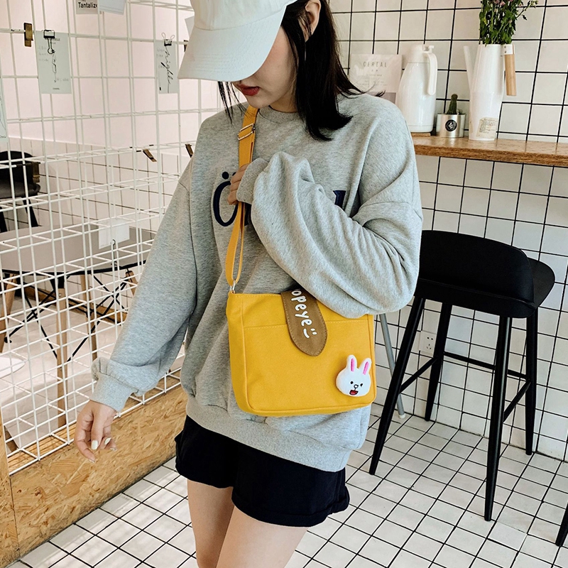 Túi đeo chéo làm bằng vải canvas phong cách Hàn dành cho phái đẹp