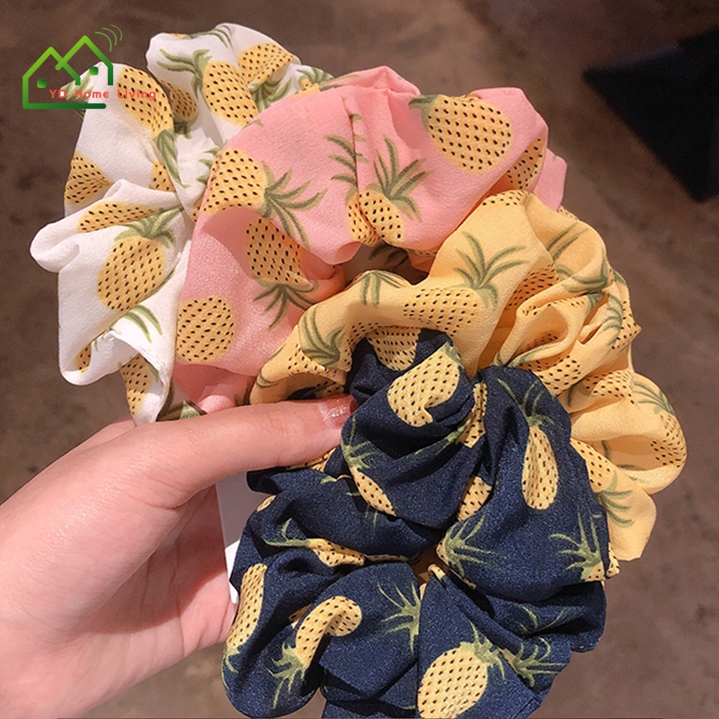 Thun cột tóc hình trái dừa phong cách thời trang dễ thương cho phái nữ