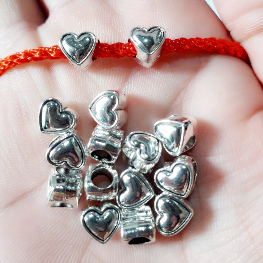 Sỉ charm xỏ giá rẻ : 50g = 23k / 1 gói [ Sỉ Charm TPHCM Giá Rẻ ]
