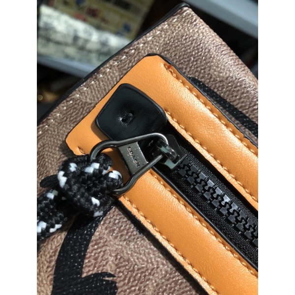 Túi coách nhà mĩm