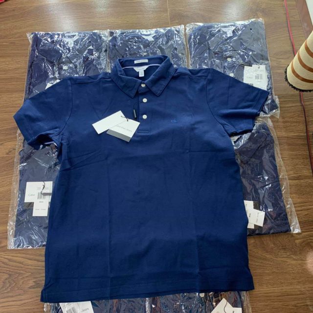 Áo polo xanh đậm