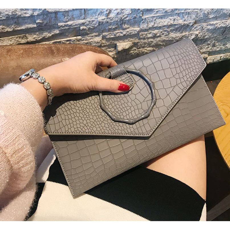 [Về lại]CLUTCH DỰ TIỆC CẦM TAY KHOEN TRÒN