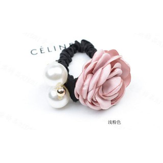 Cột tóc hoa hồng