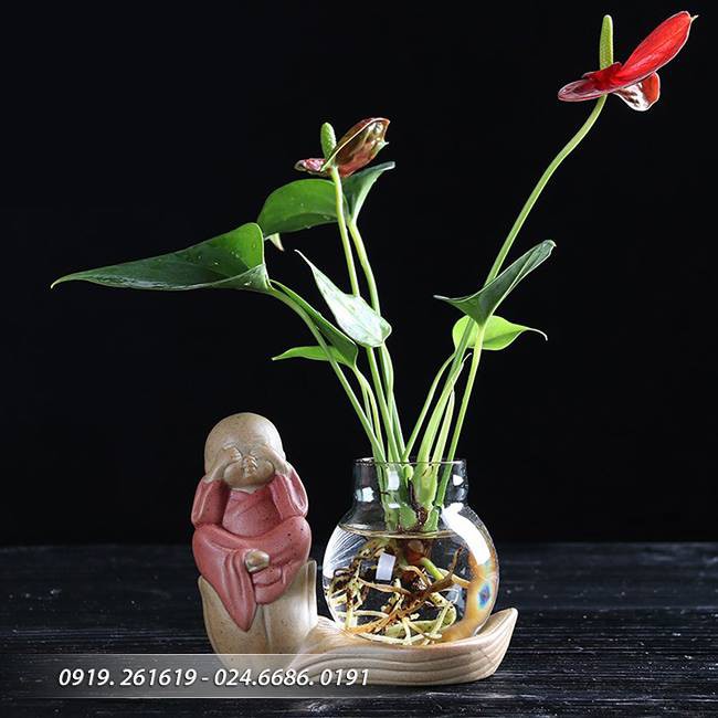 Tượng 4 không an lạc kèm bình hoa