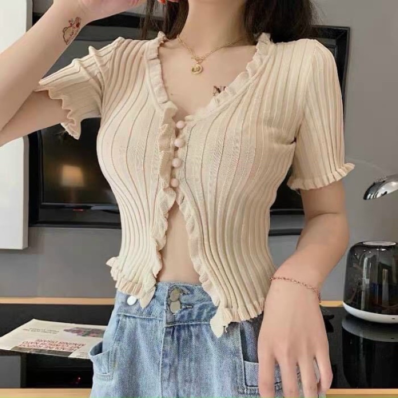 Áo len motoghi cổ v cúc ngọc