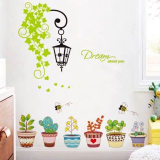 DECAL DÁN TƯỜNG ĐÈN DÂY XANH VÀ CHẬU HOA 4 MÙA