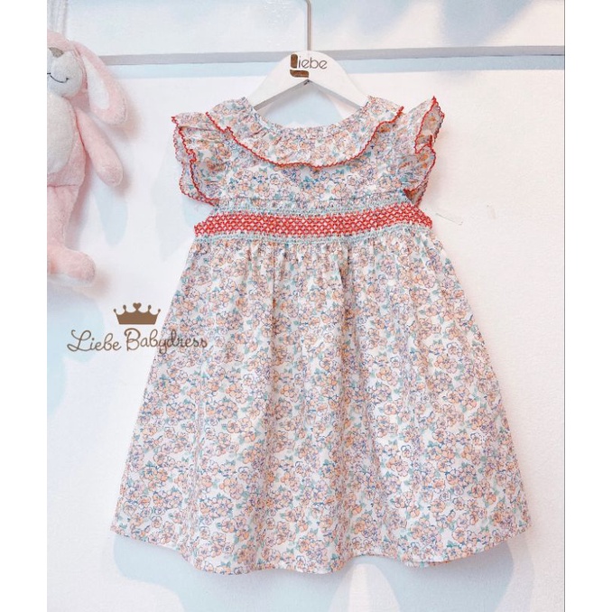Đầm hoa nhí cổ sen smock