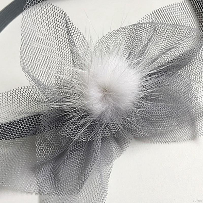 Băng đeo đầu có chi tiết quả bóng lông dễ thương cho bé