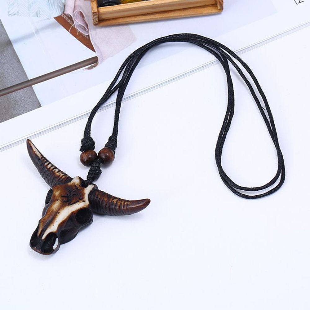 Dây Chuyền Da Bò Mặt Nhựa Trong Họa Tiết Thổ Cẩm