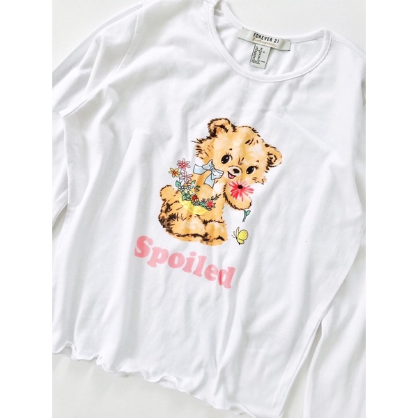 Áo croptop trắng dài tay xoăn lai in con gấu vnxk