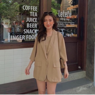 Set vest nâu ba món quần short