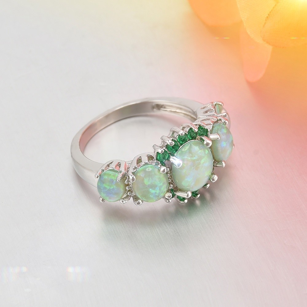 Nhẫn mặt gắn đá opal màu xanh thiết kế đơn giản sang trọng