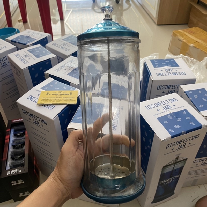 Bộ vệ sinh dụng cụ hớt tóc Andis