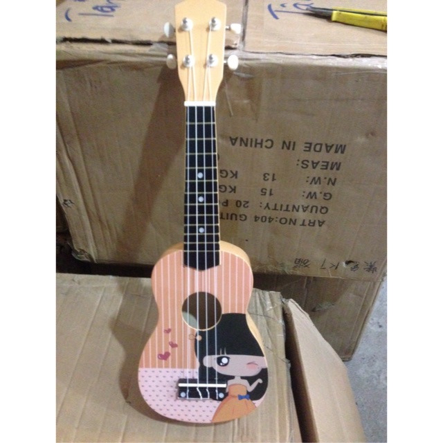 Đàn ukulele 21inch. Hinh ngộ nghĩnh. Tặng pick+ dây dự phòng. Kèm bao