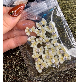 Nơ bột gắn móng trang trí móng