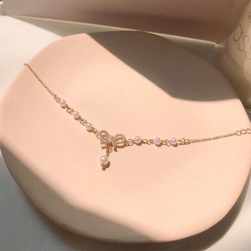 Vòng tay nơ nữ hạt châu mạ kim xinh đẹp