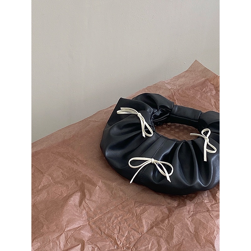 Túi xách tròn nhỏ đính nơ thời trang cho nữ