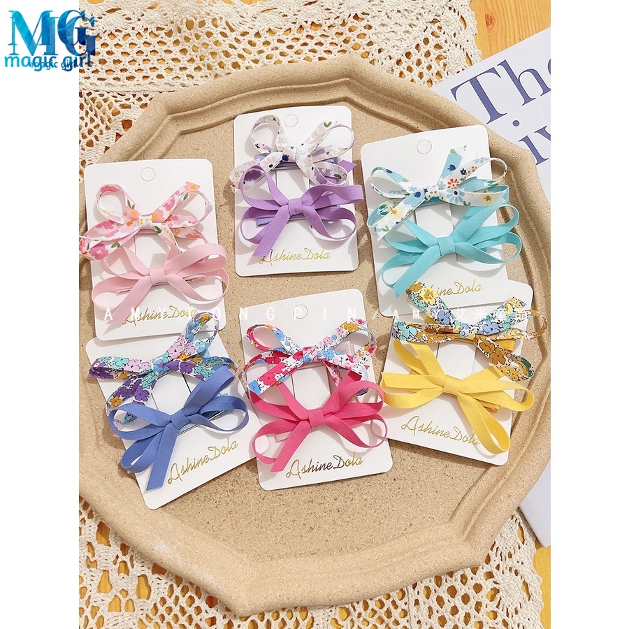 Set 2 kẹp tóc nơ màu sắc ngọt ngào phong cách Hàn Quốc cho nữ