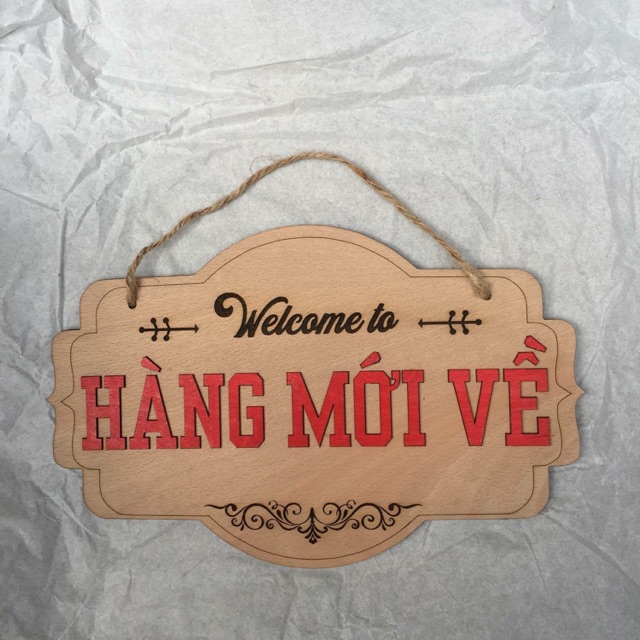 Biển chữ *hàng mới về * và * welcome*