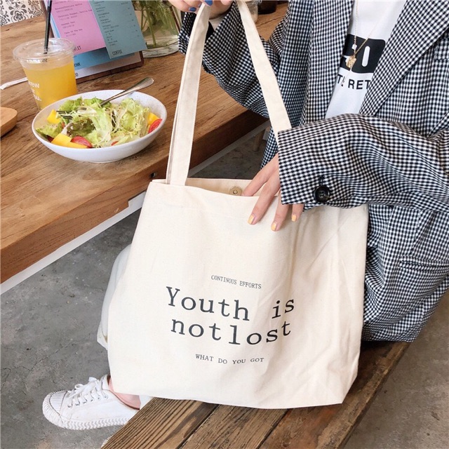 TÚI TOTE VẢI CANVAS STYLE HÀN QUỐC TONE TRẮNG NGÀY TÚI VINTAGE YOUTH IS NOT LOST CAM SHOP