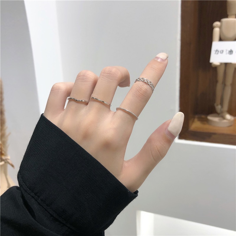 Set 4 nhẫn đeo tay chất liệu kim loại phong cách Hàn Quốc cho nữ