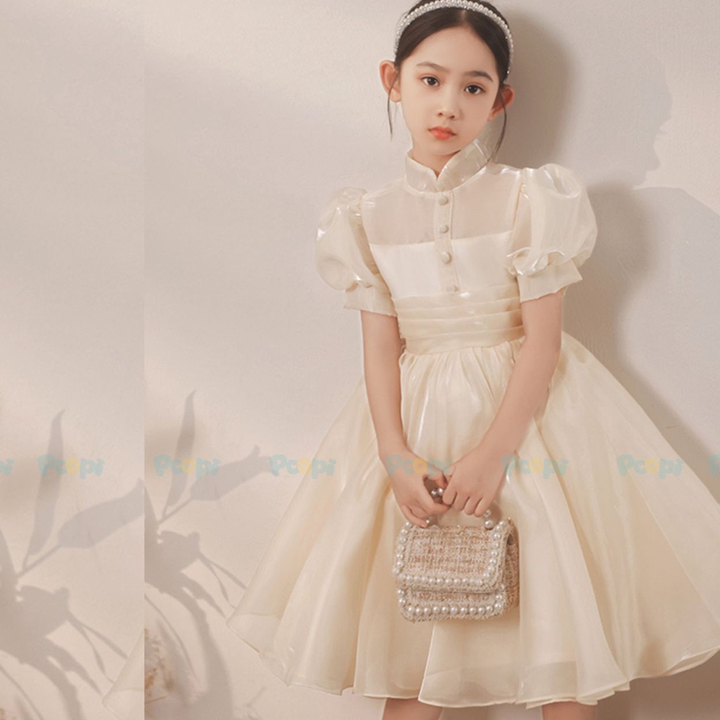 Đầm Công Chúa Cho Bé Poopi Dáng Xòe Màu Be Sữa Đính Nơ Lưng, Váy Cho Bé Gái Dự Tiệc Xinh Đẹp
