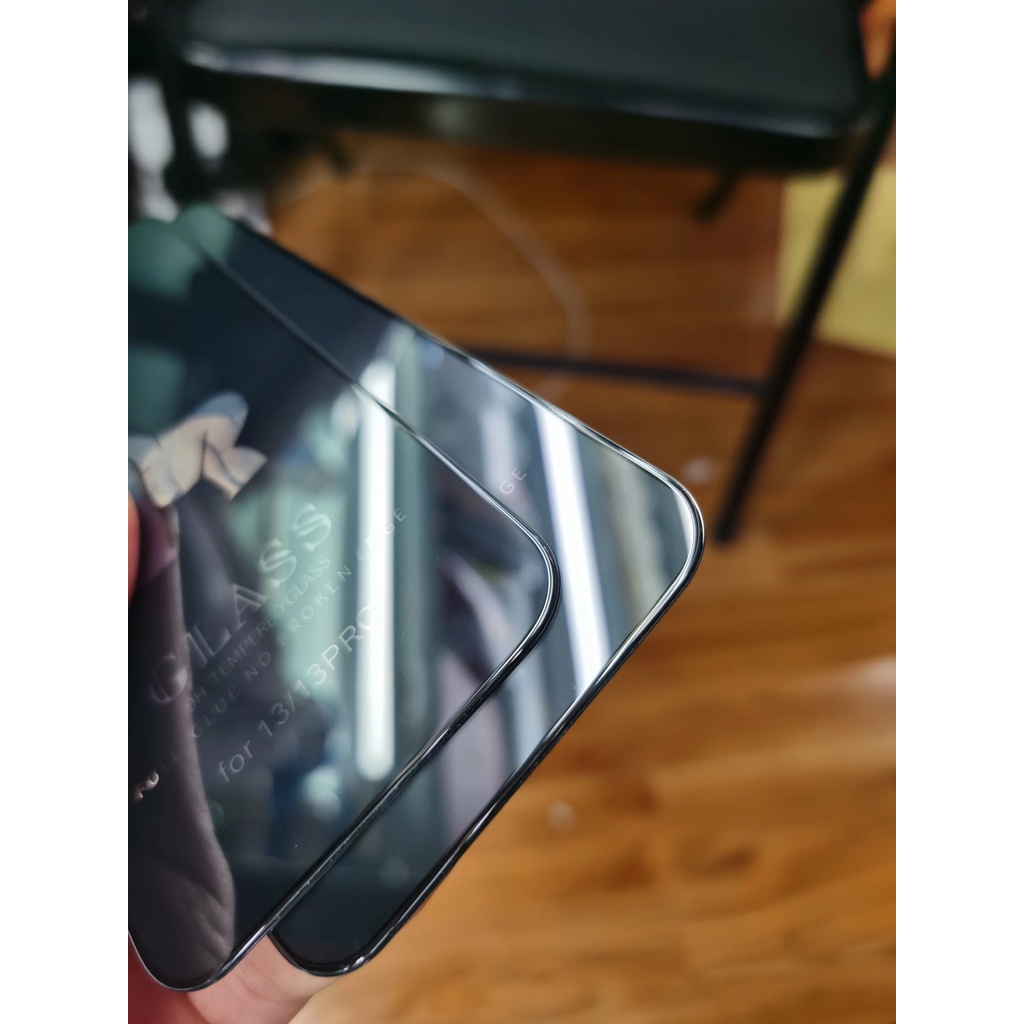 Kính cường lực iPhone Kingkong Baiko cao cấp, có màng ngăn bụi bảo vệ loa, bo viền, mặt kính phủ nano siêu mượt.