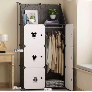 Tủ nhựa ghép 6 ô và 1 ô xéo lớn ở trên màu đen, của trắng decal quần áo
