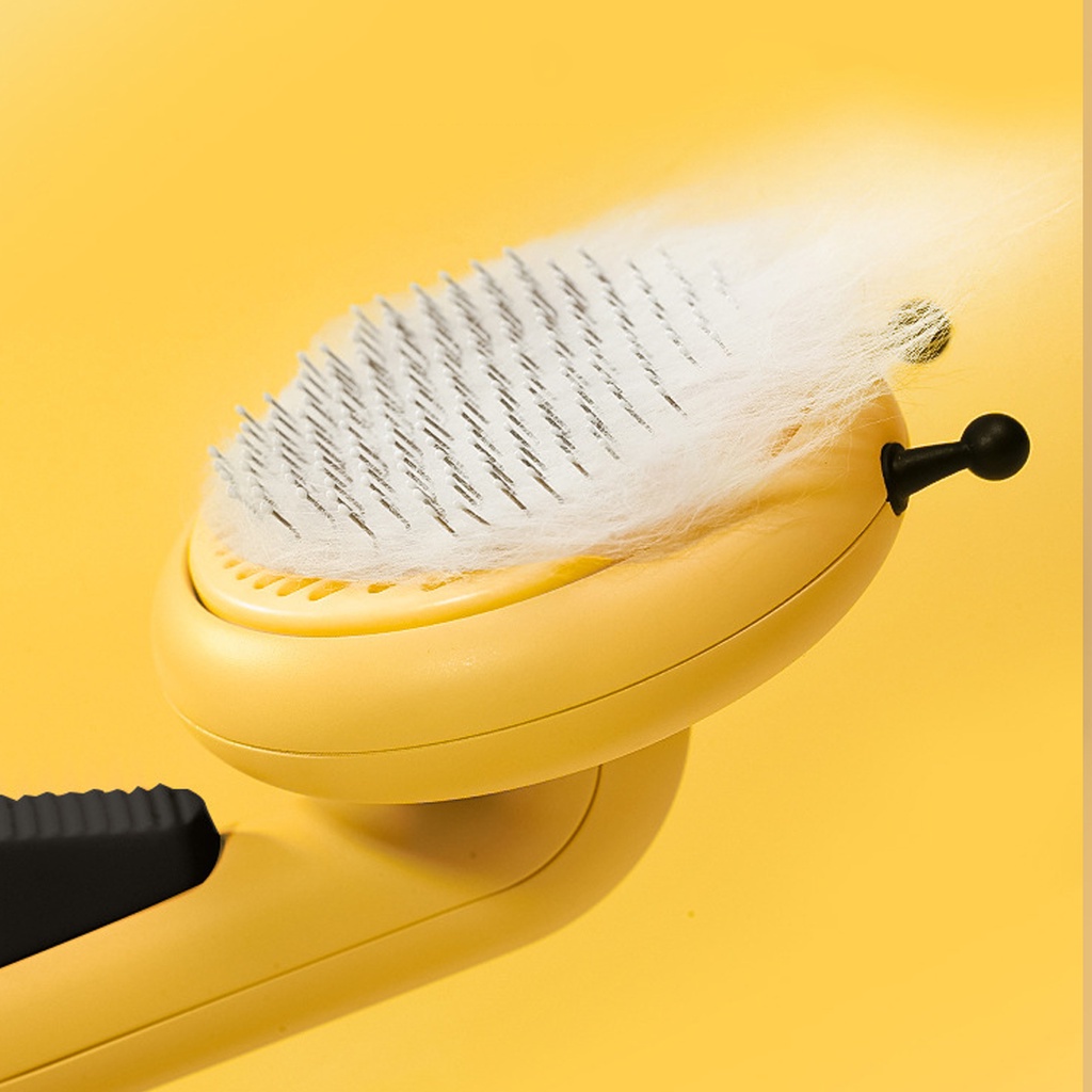 Lược chải lông chó mèo tích điện ong vàng có nút bấm cao cấp