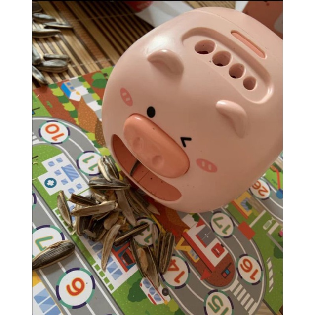 Dụng cụ tách vỏ hướng dương hình chú heo hồng