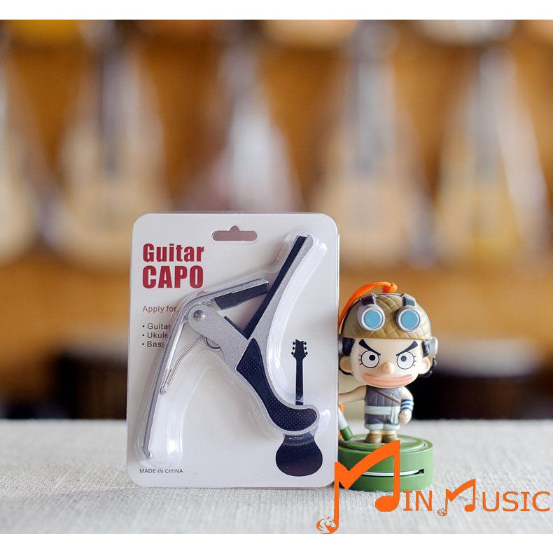 Capo đàn guitar acoustic classic Ukulele (kim loại chắc chắn)