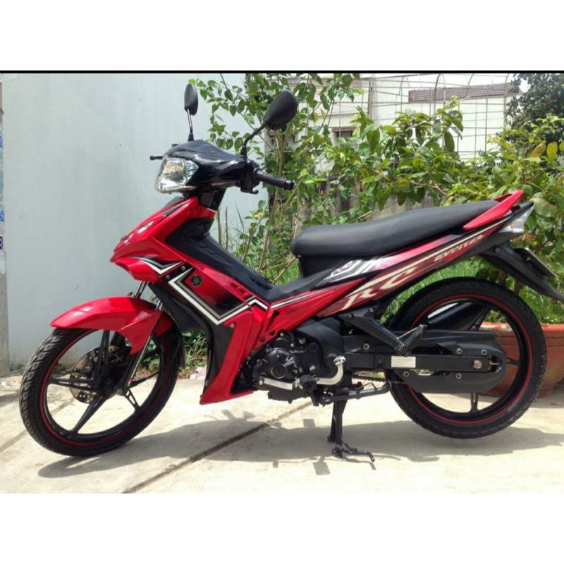 Càng để gác chân giữa xe spark, exciter 2010 côn tự động zin